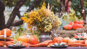 Dining table decorated with candles & flowers